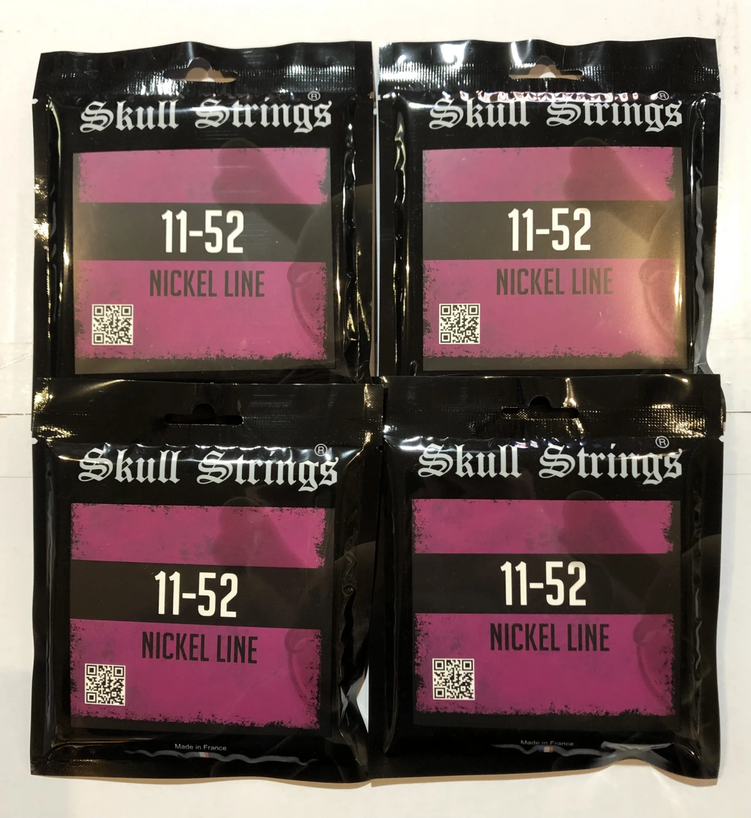 Skull Strings Nickel Line Standard Electric Guitar Strings 11-52 4 SETS 1 Skull Strings Nickel Line Standard Electric Guitar Strings 11-52 4 SETS